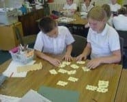 Pupils work on the history mystery cards